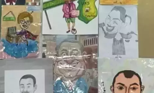 Na zdjęciu widzimy karykatury na malowane przez dzieci